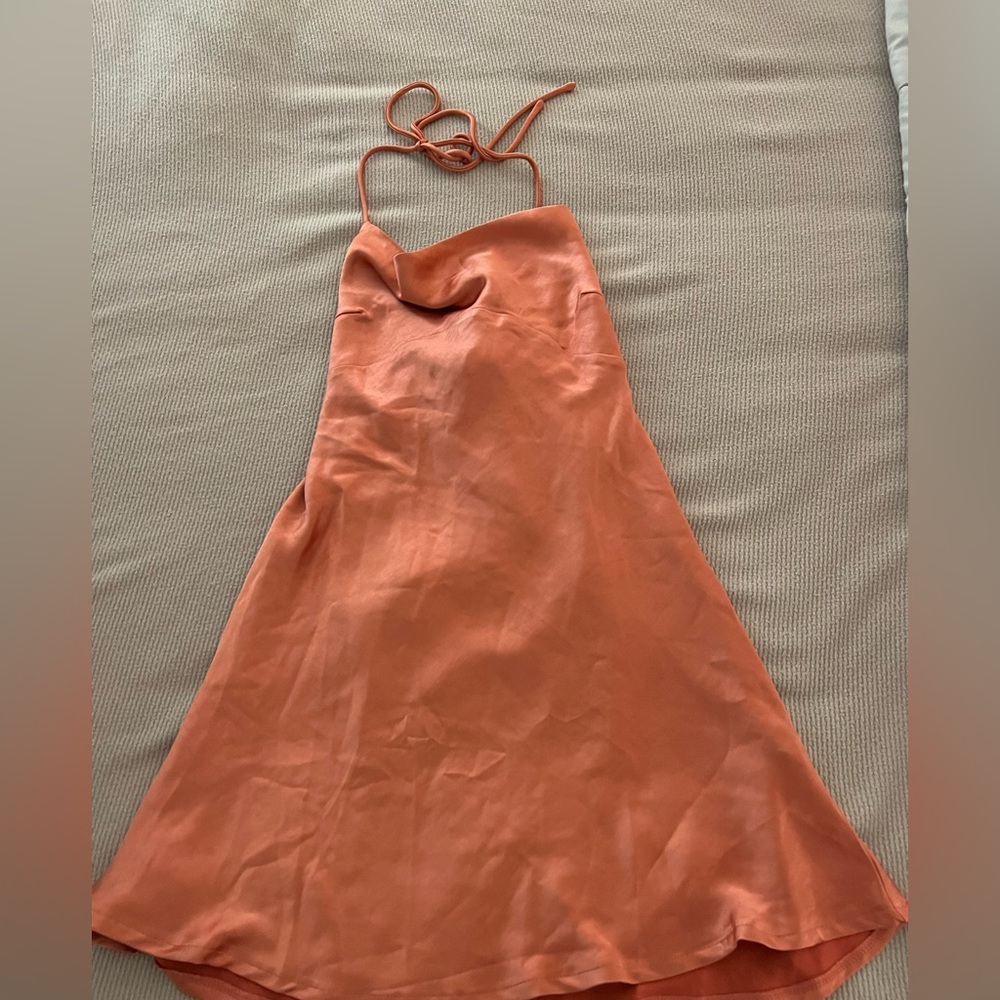 New with tags!! Hello molly halter dress! Such a cute silky dress!